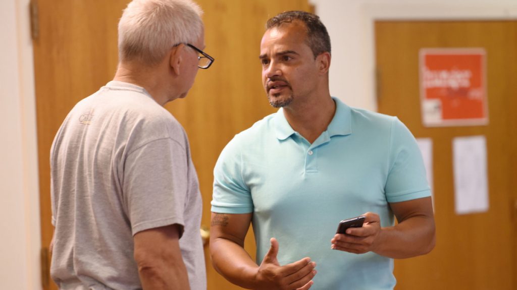  Mentor Frantz Herr (left) and returning citizen Isaac Rivera (right) have a discussion before the Lancaster County re-entry program at the Ebenezer Baptist Church Wednesday, Aug. 2, 2017, in Lancaster, Pennsylvania. (Bradley C. Bower/Philadelphia Inquirer) 