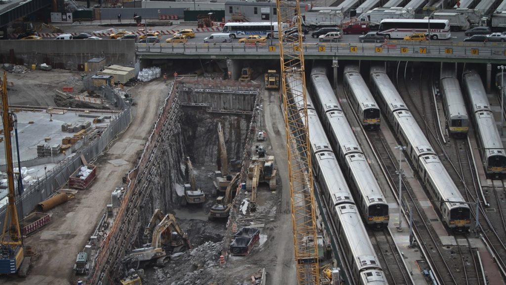 l_ap_17187531288966 Backhoes excavate in a hole reserved for a rail tunnel during the early days of construction at the Hudson Yards redevelopment site on Manhattan's west side in New York.
