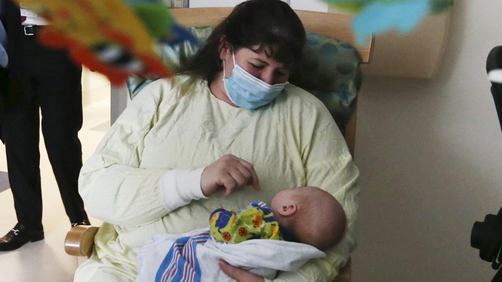 l_apneonataldrugwithdrawlx1200 A woman holds her 49-day-old grandson who was being treated for neonatal drug withdrawal after his mother took opioids during pregnancy. The baby was treated at the Neonatal Intensive Care Unit at Jersey Shore University Medical Center in Neptune Township, New Jersey. (Mel Evans/AP Photo)