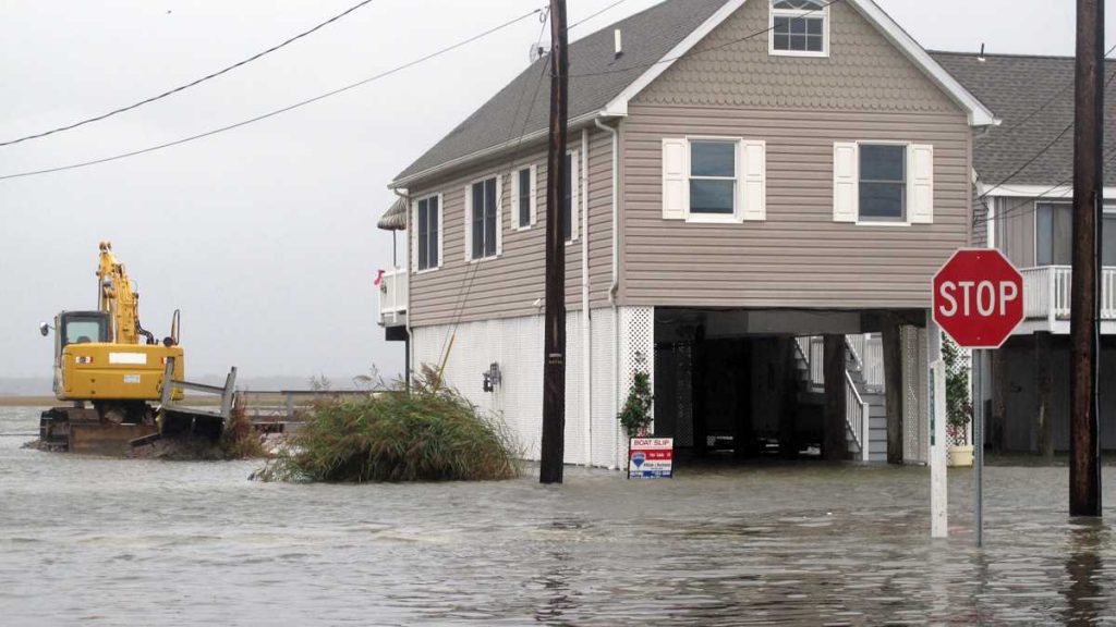 l_l_ap_572553438663-2 Flood waters enveloped this neighborhood in the Strathmere section of Upper Township, New Jersey, in early October 2015. (AP Photo/Wayne Parry)