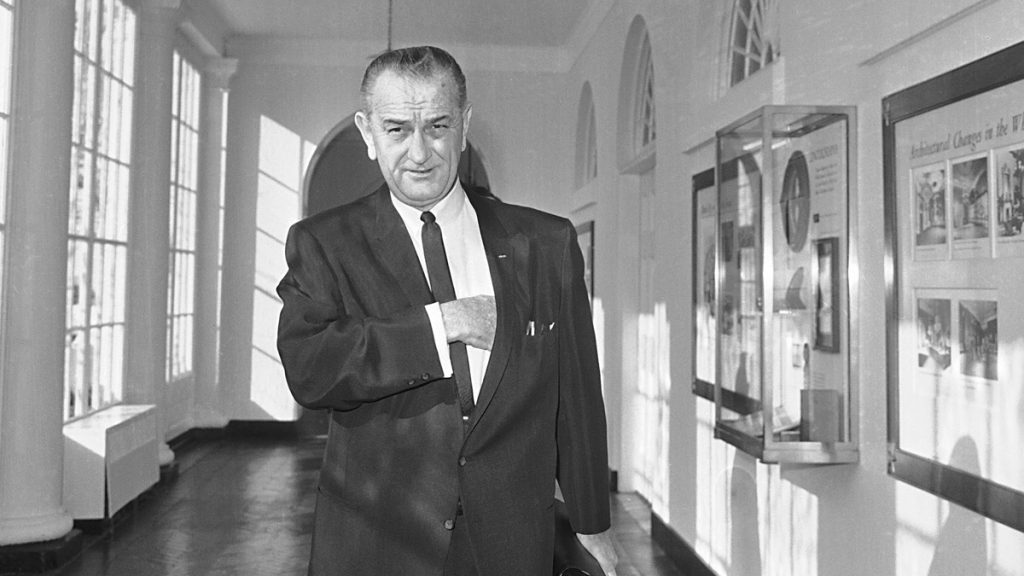 lbj_1200x675-1 President Lyndon Johnson walks from his office in the White House to a studio in the Executive Mansion to address the nation on the bombing of North Vietnam, Jan. 31, 1966. (AP Photo, file)