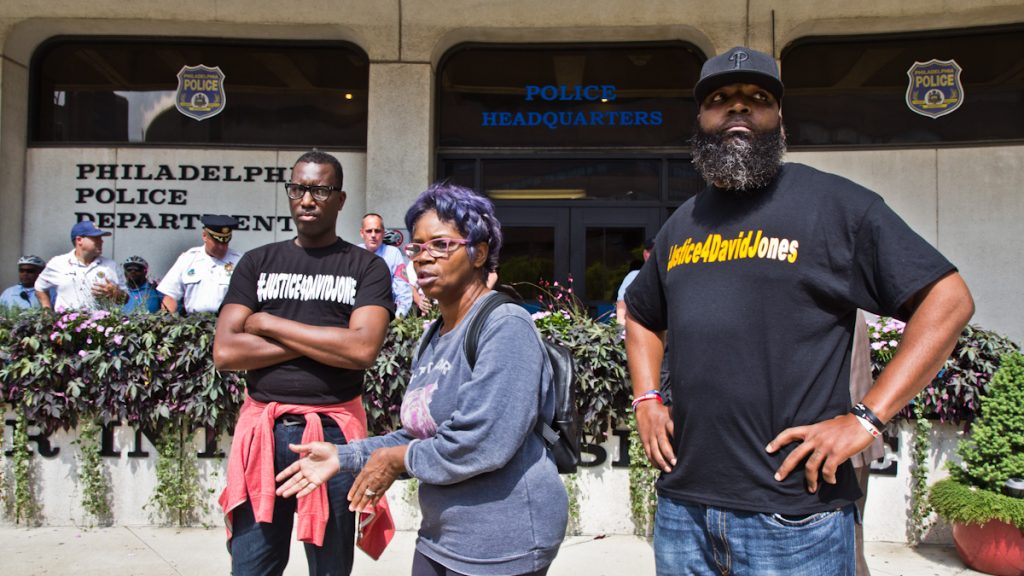 pownall-fired-2 Asa Khalif, organizer of Black Lives Matter's Philadelphia chapter, Rowena Faulk, and Isaac Gardner, protested outside police headquarters Thursday to demand murder charges be brought against officer Pownall.