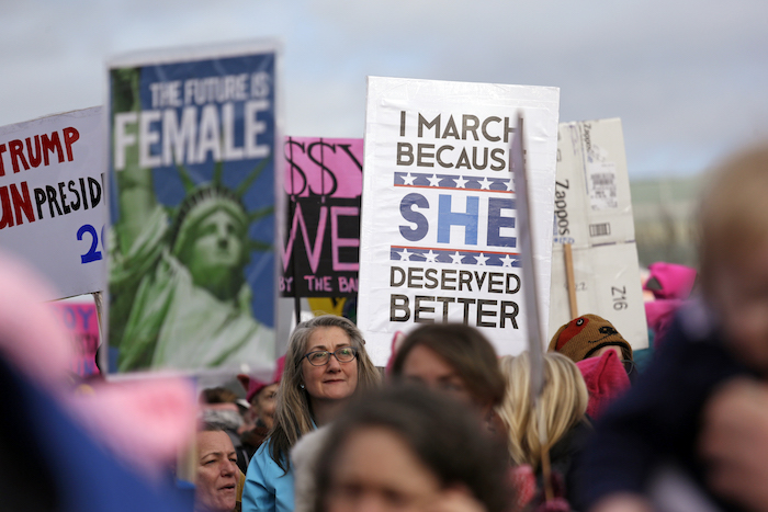 Protesters crowd a park to overflowing for a rally before a women's march Saturday, Jan. 21, 2017, in Seattle. Women across the Pacific Northwest marched in solidarity with the Women's March on Washington and to send a message in support of women's rights and other causes. (AP Photo/Elaine Thompson)