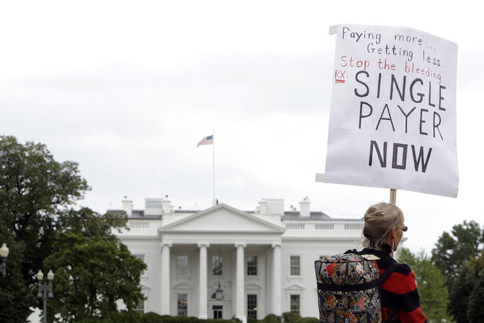 Mary Jo Groves, a medical doctor from Springfield, Ohio, attends a rally hosted by The Mad As Hell Doctors tour to raise support for health care reform and a single payer system, Wednesday, Sept. 30, 2009 at Lafayette Park in Washington. (AP Photo/Haraz N. Ghanbari)