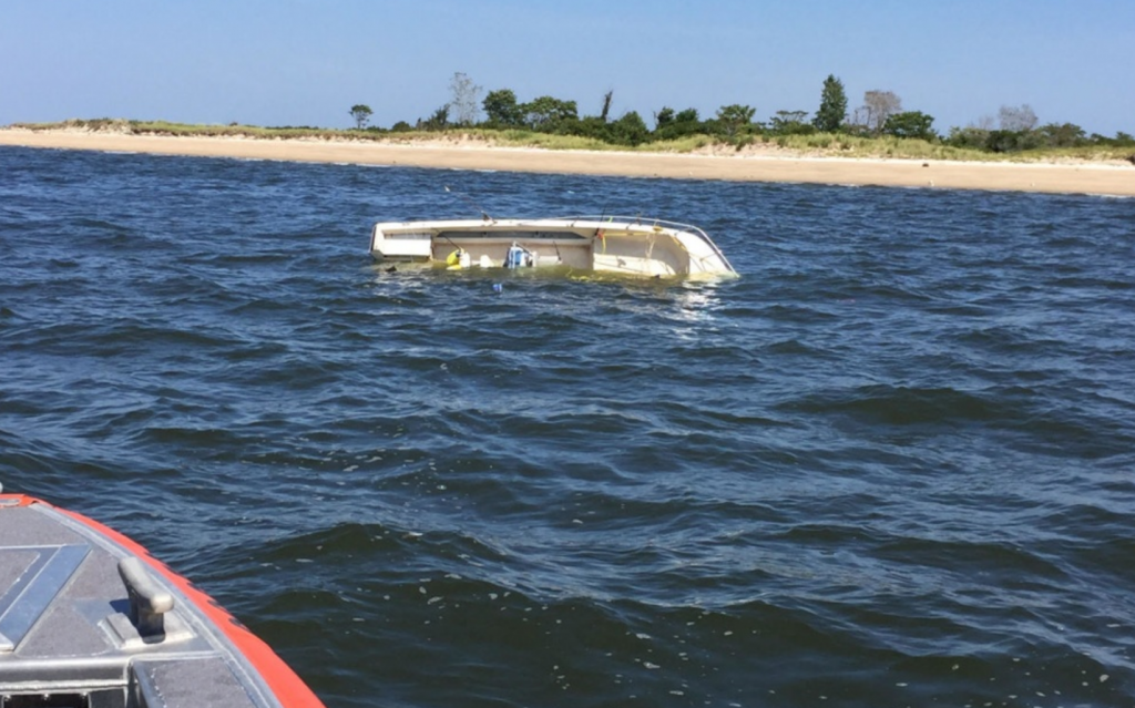 screen-shot-2017-09-05-at-11-04-25-am A capsized boat off Sandy Hook in Monmouth County Monday afternoon. (USCG image)