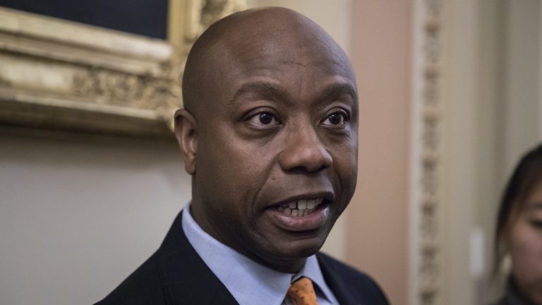  Sen. Tim Scott, R-S.C., the only African-American Republican serving in the Senate, talks to reporters about his plan to meet with President Donald Trump to discuss race and Trump's widely criticized response to last month's protests and racial violence in Charlottesville, Va., at the Capitol in Washington, Wednesday, Sept. 13, 2017. (AP Photo/J. Scott Applewhite) 
