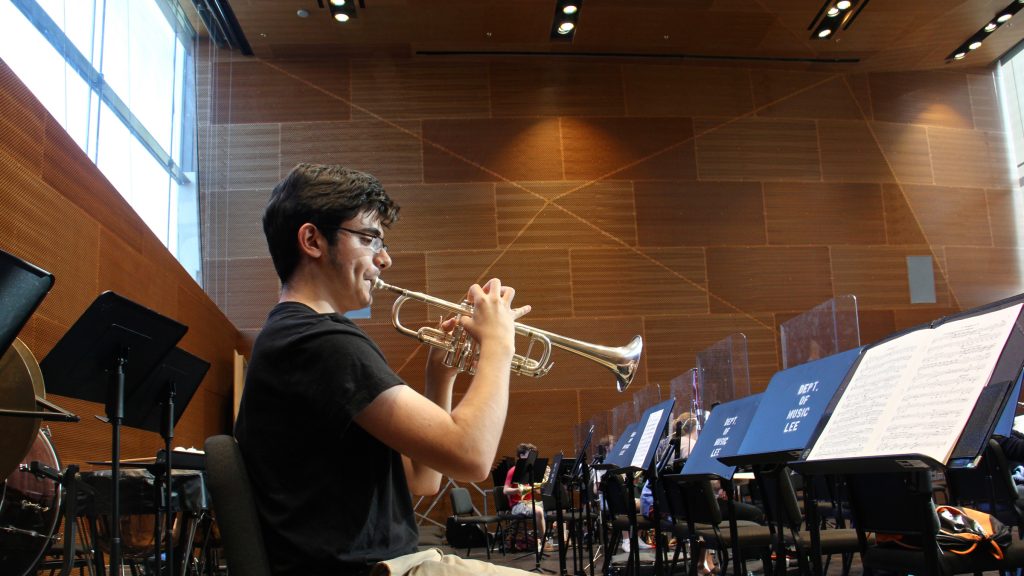 1 2017 09 25-e lee-princeton university-lewis center for the arts complex tour A trumpeter warms up in the Lee Music Performance and Rehearsal Room. (Emma Lee/WHYY)