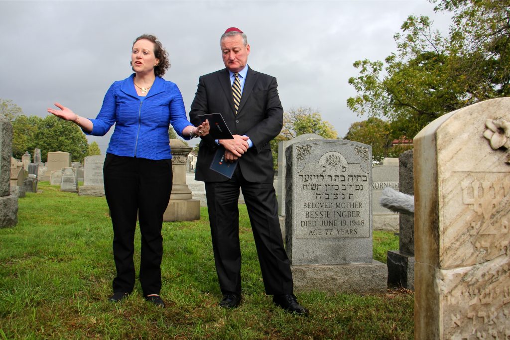 2017 10 24-e lee-naomi adler jim kenney-philadelphia mount carmel cemetery-vandalized tombstones repaired Naomi Adler, CEO of the Jewish Federation of Greater Philadelphia, sings a prayer during a visit to Mt. Carmel Cemetery with Mayor Jim Kenney, who toured the site to see the repairs made to vandalized tombstones
