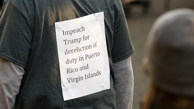 Victor Edgar Rivera, of South Jersey, protests the response of the Trump administration to the growing humanitarian crisis on Puerto Rico and the Virgin Islands. (Bastiaan Slabbers for WHYY)