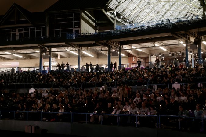 Candles are lit during the Regional Candlelight Vigil on October 14, 2017, at Camden Waterfront Stadium. (Bastiaan Slabbers for WHYY)