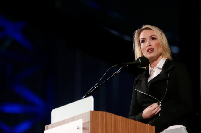 Tara Conner, Miss USA 2006, speaks at the Regional Candlelight Vigil at Camden Waterfront Stadium on October 14, 2017.