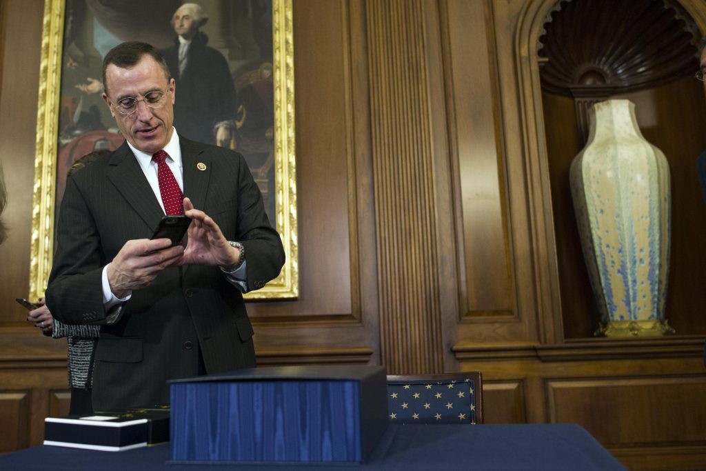 Rep. Tim Murphy Rep. Tim Murphy, R-Pa., take a photo of the 21st Century Cures Act prior to a signing ceremony on Capitol Hill in Washington, Thursday, Dec. 8, 2016. (AP Photo/Cliff Owen)