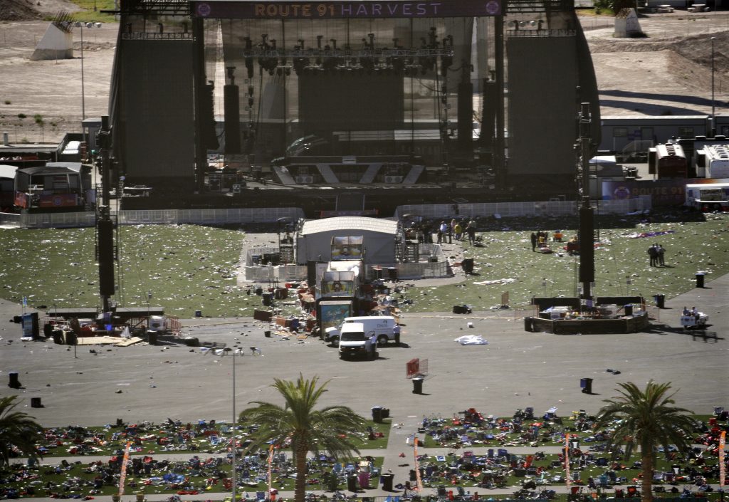 Las Vegas Shooting Debris is strewn through the scene of a mass shooting at a music festival near the Mandalay Bay resort and casino on the Las Vegas Strip, Monday, Oct. 2, 2017, in Las Vegas. (AP Photo/John Locher)