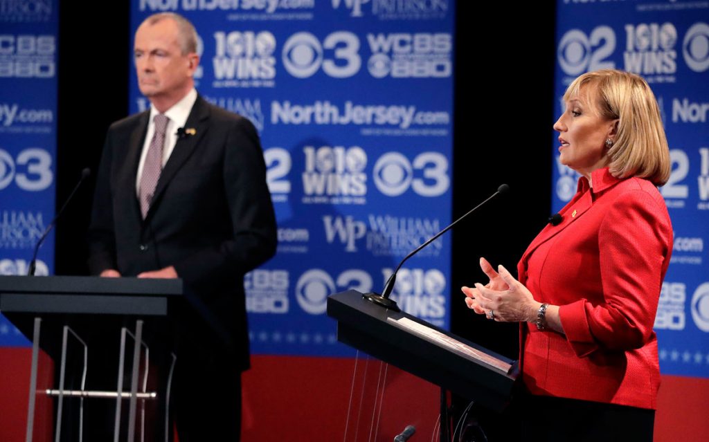 AP_17291845211311-1200 Republican nominee Lt. Gov. Kim Guadagno, right, answers a question during a gubernatorial debate against Democratic nominee Phil Murphy at William Paterson University in Wayne, N.J. (AP Photo/Julio Cortez, pool)