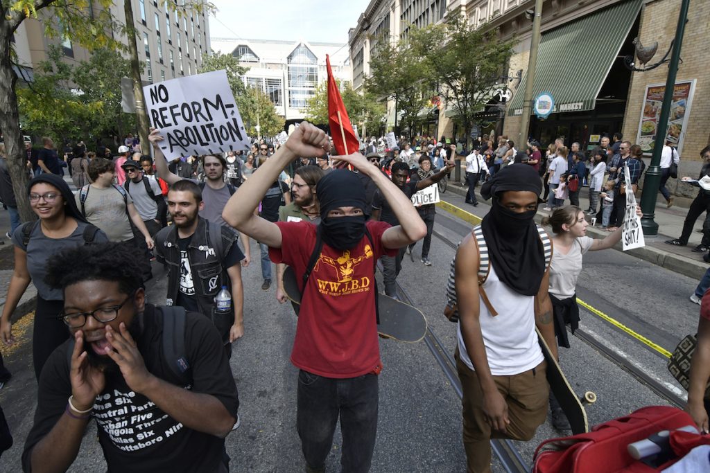 Violent protest outside IACP conference, in Philadelphia, PA Masked protesters march through the city streets