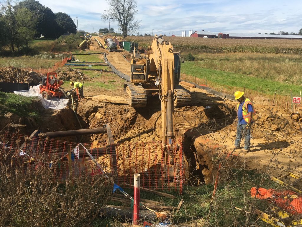 Mariner-East-2-construction-Lebanon-County-e1507230740582 A backhoe digs a path for a pipeline in Pennsylvania