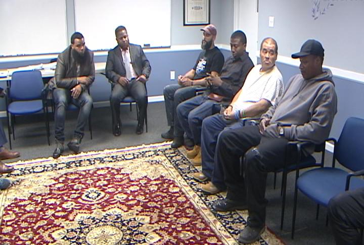 Members of the Peers Mentoring Center talk about the right mindset to stay out of trouble after prison. (Gene Ashley/WHYY)