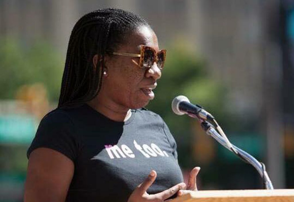 Tarana Burke – Philly, 2014 March Against Rape Culturex1200 A woman in a black tshirt that reads