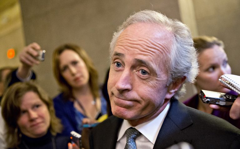 Sen. Bob Corker is shown talking to reporters in 2013