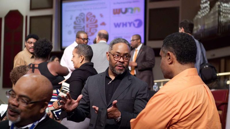 Rev. Dr. Alyn Waller, Pastor at Enon Tabernacle Baptist Church mingles after the forum concludes. (Bastiaan Slabbers for WHYY)