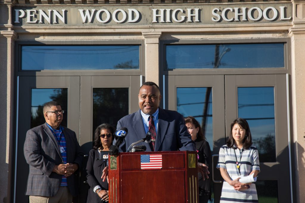 cohen-pennwood_presser-2 A man at a podium outside the Penn Wood High School