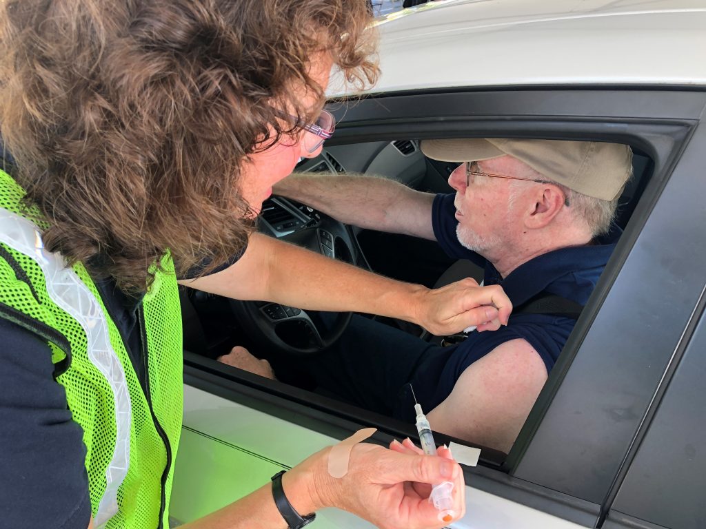 flu shot Hundreds of drivers got their flu vaccine at a drive-through clinic in Dover in October. (Kyle Bressler/WHYY)
