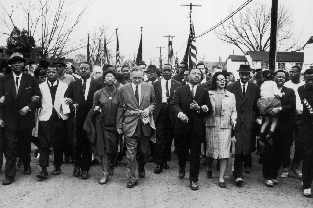 Civil rights leader Rev. Martin Luther King Jr. and his wife Coretta Scott King lead a black voting rights march from Selma, Ala., to the state capital in Montgomery in 1965. Civil rights leader Rev. Martin Luther King Jr. and his wife Coretta Scott King lead a black voting rights march from Selma, Ala., to the state capital in Montgomery in 1965.
(William Lovelace/Getty Images)