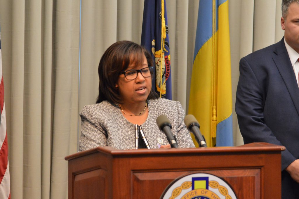 hodges A woman at a podium