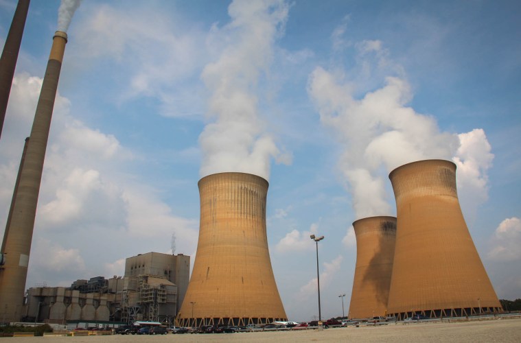 homer-city-plant Cooling towers belch white smoke into the cloudy blue sky