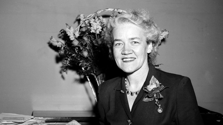 Sen. Margaret Chase Smith, R-Me., smiles Jan., 5, 1949, as she takes a break from looking over papers in her office in Washington D.C.