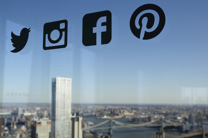 Social Media (AP Photo/Mark Lennihan)