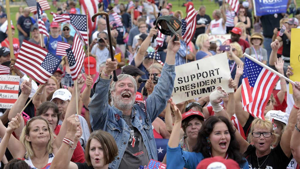 APTOPIX Washington Protests People gather on the National Mall in Washington, Saturday, Sept. 16, 2017, to attend a rally in support of President Donald Trump.