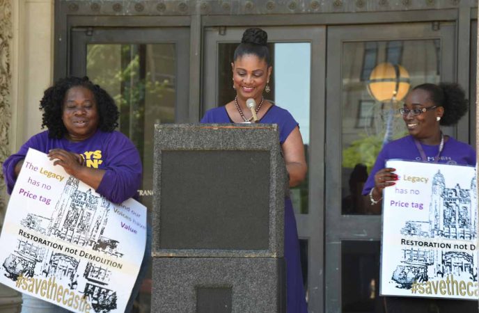 In May 2017, CHS alum Dr. Doris Carpenter speaks on the steps of the Trenton State House after Preservation New Jersey named Camden High one of the ten most endangered historical buildings in the state; she is flanked by education activists Vida Neil, at left; and Moneke Singleton-Ragsdale.  Carpenter studied Gothic architecture for an estimated 150 hours to obtain a certificate of eligibility for historic status of the building.  (April Saul/for Newsworks)