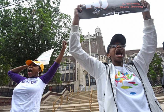 Activists demonstrate in front of Camden High to save the school in July 2017. (April Saul/for Newsworks)