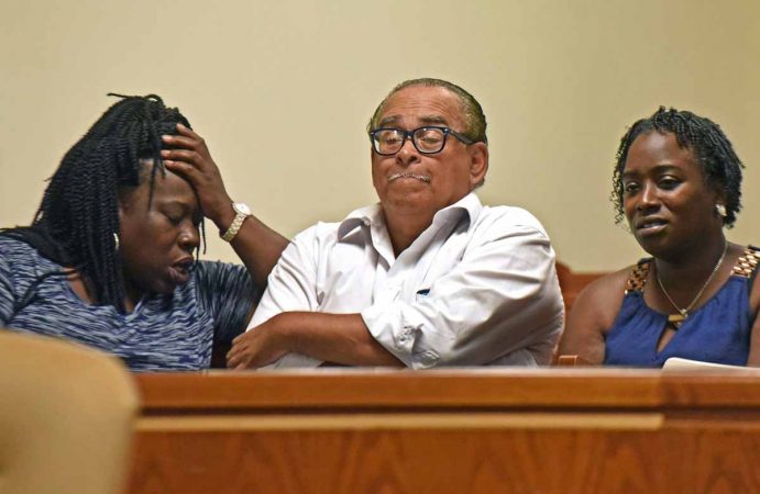 From left to right, Camden community activists Vida Neil, Stan White and Moneke Singleton-Ragsdale react to an August 2016 court decision that failed to help restore an elected board of education to their city. (April Saul/for Newsworks)