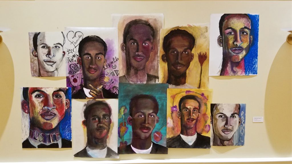 2017 11 02-p crimmins-philadelphia presbyterian church of chestnut hill-festival of music and arts Portraits of the victims of gun violence hang on the walls at the chestnut hill presbyterian church