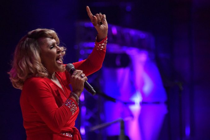 Darlene Love performs as Dionne Warwick receives the Marian Anderson Award at a ceremony at the Kimmel Center, on Tuesday. (Bastiaan Slabbers for WHYY)