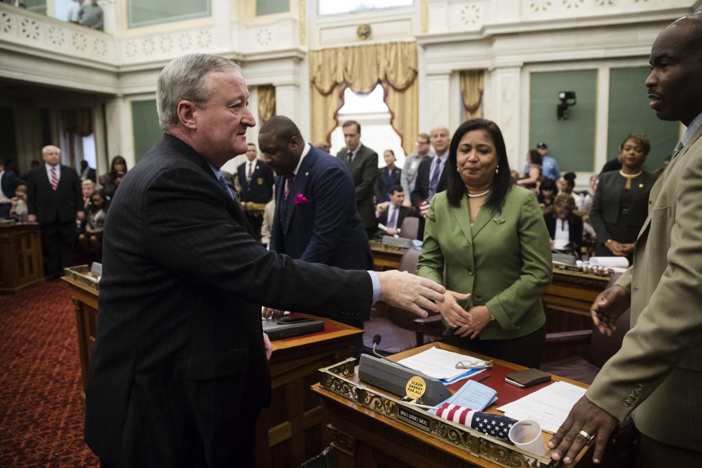 Philadelphia Schools-Control Philadelphia Mayor Jim Kenney, left, shakes hands with members of City Council after speaking at City Hall in Philadelphia. Kenney on Thursday called for the panel that governs the city's schools to be dissolved and replaced by mayor-appointed board.
