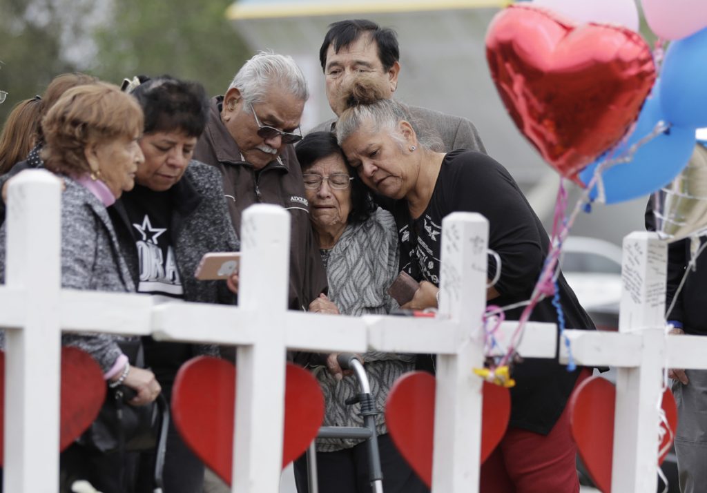 Church Shooting Texas Family and friends gather around a makeshift memorial for the victims of the First Baptist Church shooting at Sutherland Springs Baptist Church, Friday, Nov. 10, 2017, in Sutherland Springs, Texas. A man opened fire inside the church in the small South Texas community on Sunday, killing more than two dozen. (Eric Gay/AP Photo)