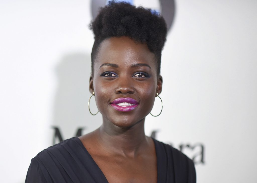 Lupita Nyong’o In this June 13, 2017 file photo, Lupita Nyong'o attends the Women In Film 2017 Crystal and Lucy Awards in Beverly Hills, Calif. Nyong’o became the lone public woman of color among Weinstein’s litany of accusers, writing in a New York Times op-ed last month that she had an unsettling encounter with the producer in 2011 at his home in Connecticut. (Richard Shotwell/Invision/AP, File)