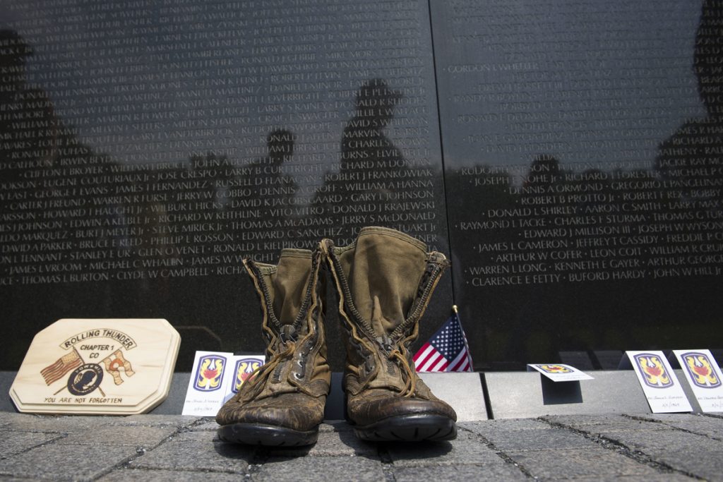 Rolling Thunder A pair of military boots are left at the Vietnam Veterans Memorial during the 30th anniversary of the Rolling Thunder 'Ride for Freedom' demonstration in Washington, Sunday, May 28, 2017. (Cliff Owen/AP Photo)