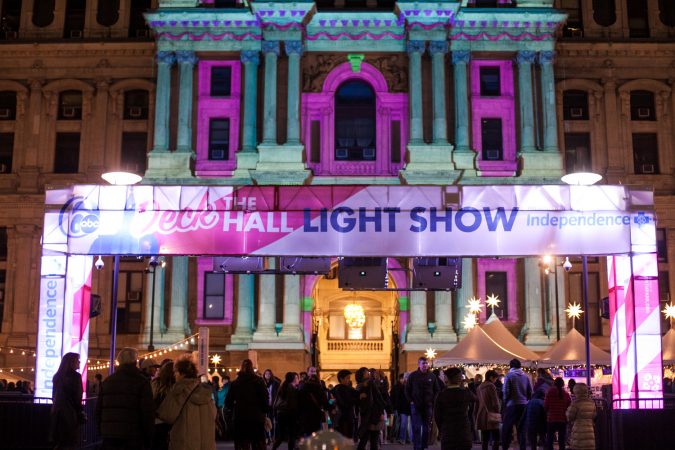 The facade of CIty Hall is lit by spotlights for the Christmas season. (Brad Larrison for WHYY)