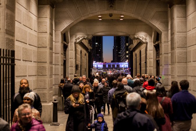 File photo: The City Hall Christmas tree lighting ceremony and Christmas Village draws thousands to Center City. (Brad Larrison for WHYY)