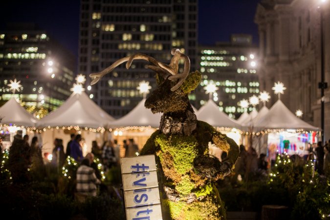 A reindeer made of plants is a featured decoration in the garden maze at Dilworth Park. (Brad Larrison for WHYY)