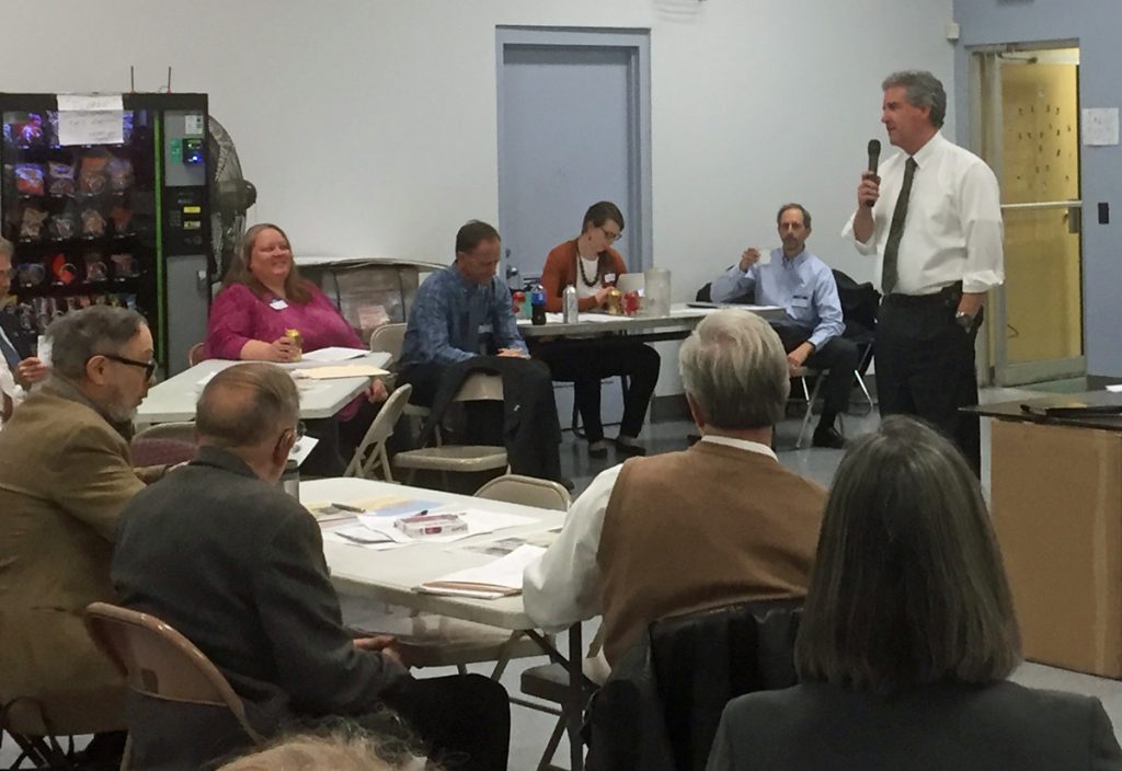 HYYZRCZAx1200 DNREC Secretary Shawn Garvin speaks to concerned citizens at a public workshop about Coastal Zone Act regulations. (Zoe Read/WHYY)