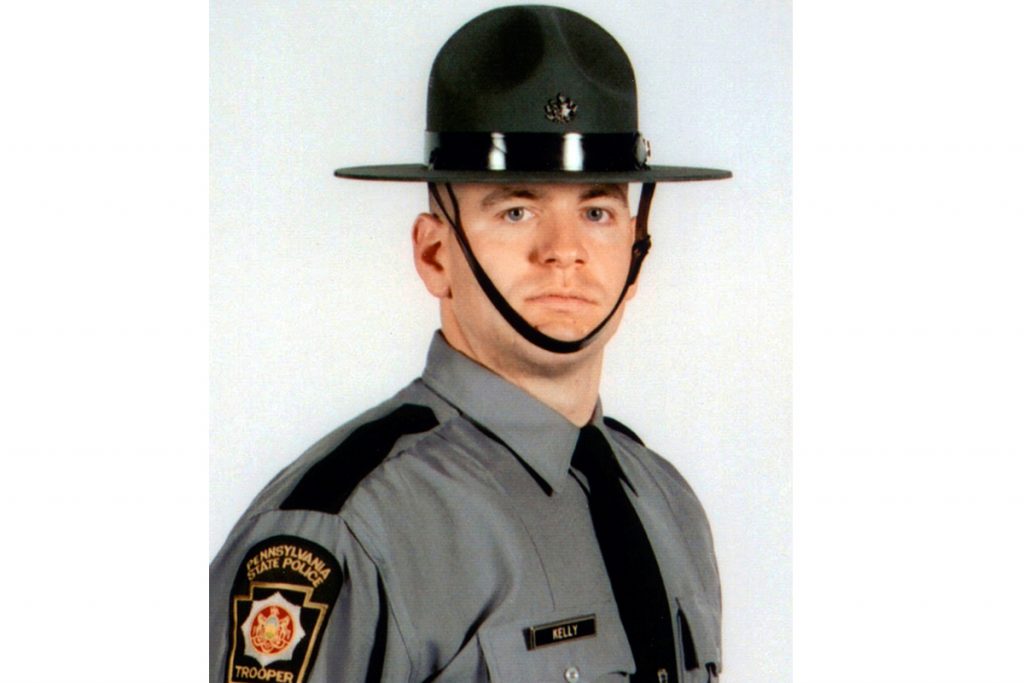 In this undated photo released by the Pennsylvania State Police, Cpl. Seth J. Kelly, is shown. Authorities have identified a Kelly as the Pennsylvania State Police trooper who was shot several times Tuesday, Nov. 7, 2017, during a traffic stop and remains hospitalized in critical condition. (Pennsylvania State Police via AP Photo)