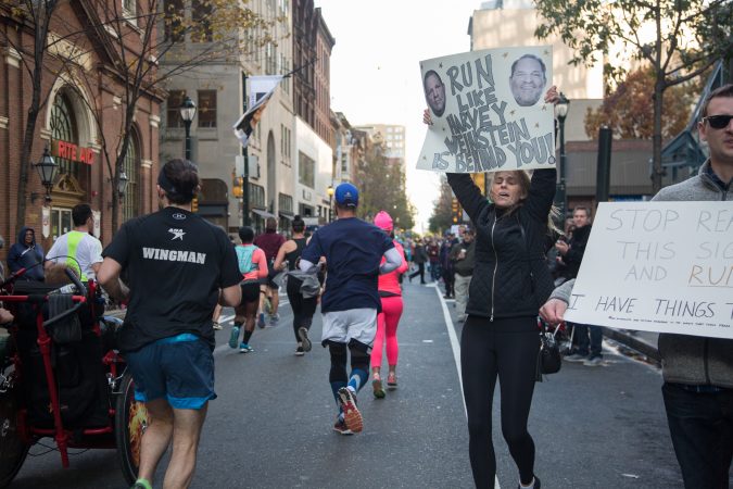 Spectators cheer on their friends and other runners as they pass by at the 23rd annual Philadelphia Marathon on Sunday, November 19th, 2017.