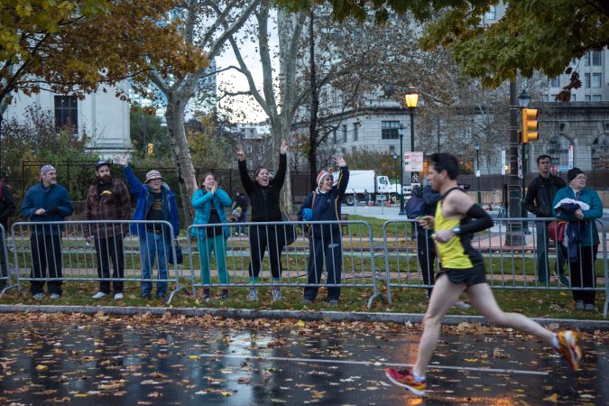 Spectators cheer on their friends and other runners as they pass by at the 23rd annual Philadelphia Marathon on Sunday November 19th, 2017. (