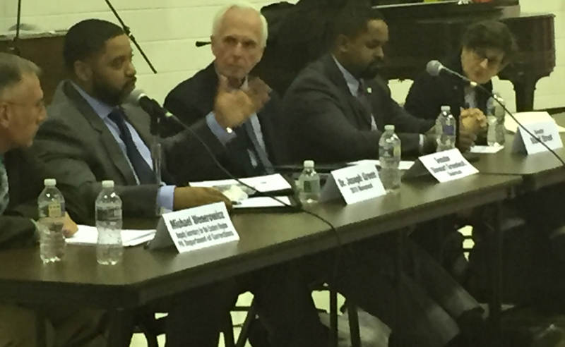 Stewart Greenleaf (third from left) and Sharif Street (fourth from left) held the second of three judiciary hearings on criminal justice reform at Deliverance Evangelistic Church in North Philadelphia. (Annette John-Hall, WHYY)
