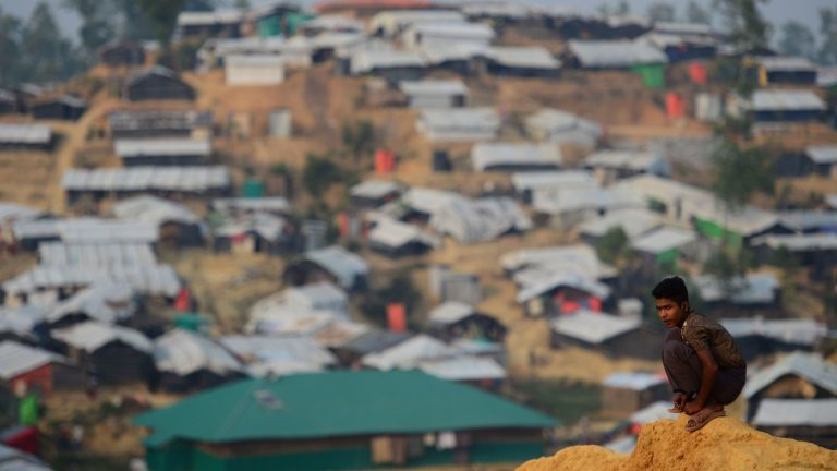 
A Rohingya refugee boy looks on at Balukhali refugee camp in the Bangladeshi district of Ukhia on Wednesday. An estimated 618,000 Muslim Rohingya have fled mainly Buddhist Myanmar since a military crackdown was launched in Rakhine in August. Refugees describe a campaign of rape, murder and arson. (Munir Uz Zaman/AFP/Getty Images)
